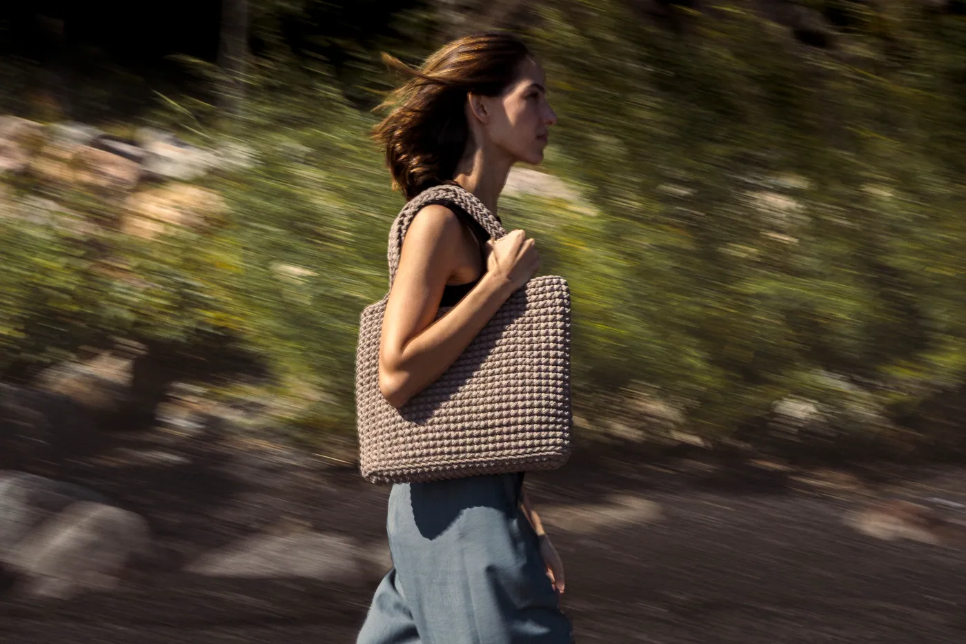 Inès bag carried outdoors in an editorial photograph